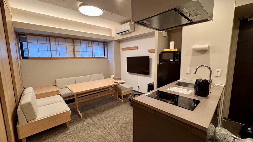 Mimaru Suites Tokyo Nihonbashi - a living area and kitchen.