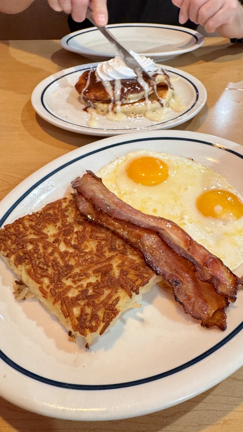 Rise and shine with a combo of bacon, eggs, hash browns and pancakes at International House of Pancakes.