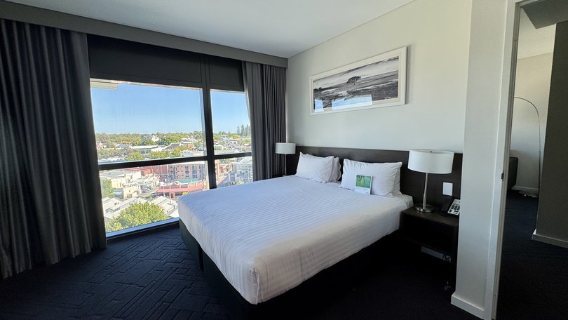 Wake up to views across the suburb as far as the city from a ninth-floor premier suite at the Vibe Hotel Subiaco.