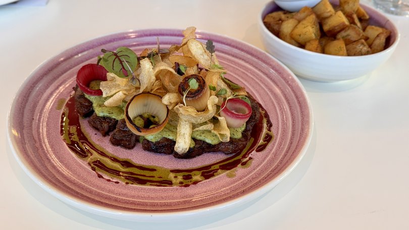 Donnybrook pink beef scotch fillet and duck fat potatoes at The Storehouse atop the Vibe Hotel Subiaco.