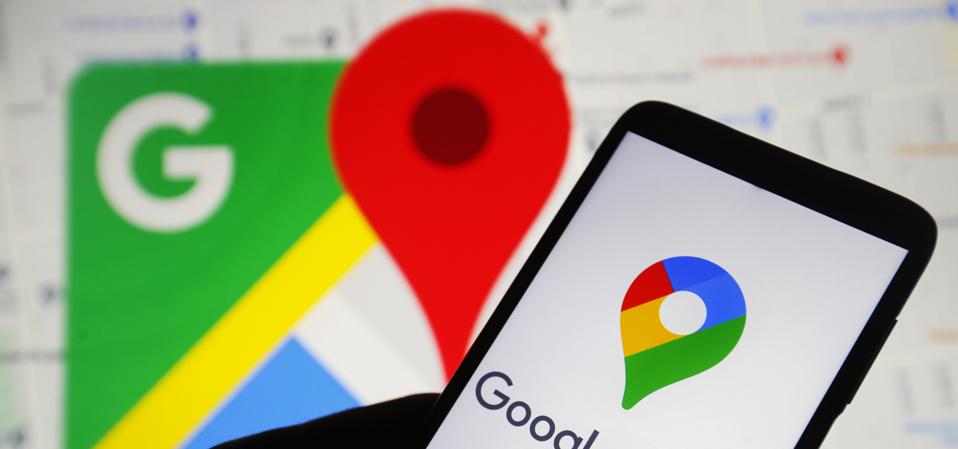 In this photo illustration, the  Google Maps logo is seen on