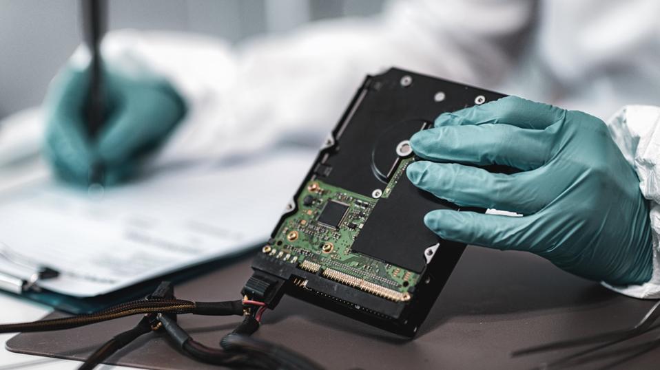 Forensic Science Technician Analyzing Evidence in Laboratory