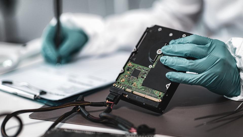 Forensic Science Technician Analyzing Evidence in Laboratory