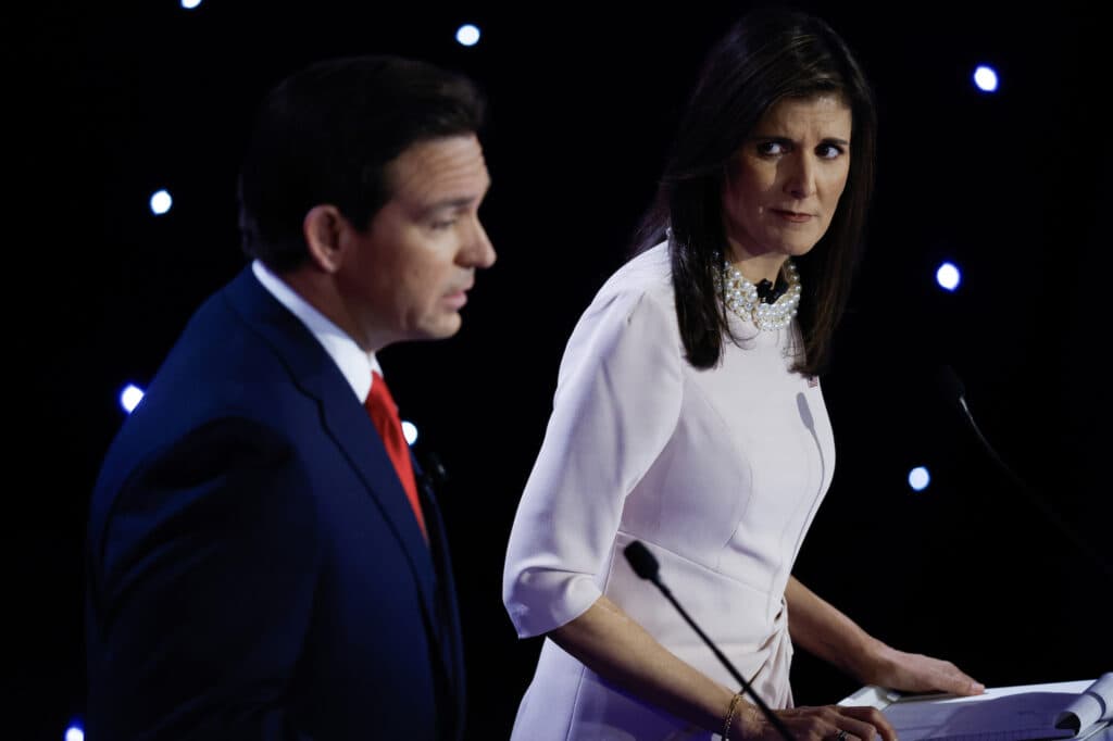 DES MOINES, IOWA - JANUARY 10: Republican presidential candidates Florida Gov. Ron DeSantis and former U.N. Ambassador Nikki Haley participate in the CNN Republican Presidential Primary Debate in Sheslow Auditorium at Drake University on January 10, 2024 in Des Moines, Iowa. DeSantis and Haley both qualified for this final debate before the Iowa caucuses, while former President Donald Trump declined to participate and instead held a simultaneous town hall event live on FOX News. (Photo by Chip Somodevilla/Getty Images)