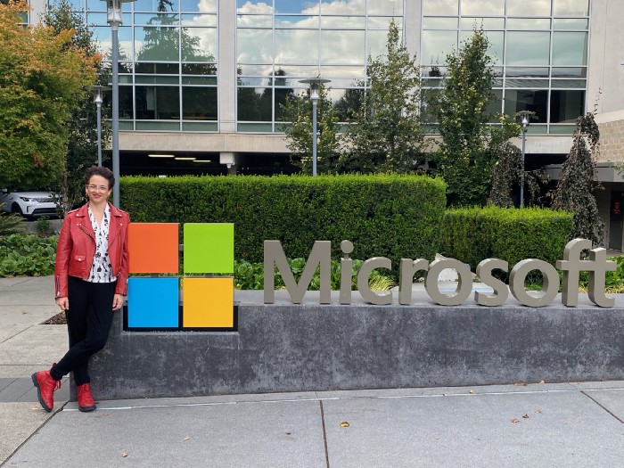 author Alexandra Samuel standing next to Microsoft sign on Microsoft campus