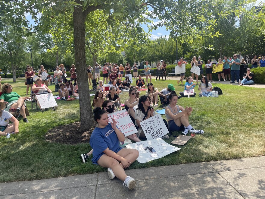 Pro-choice abortion protestors gather to hear speakers at an event in Bowling Green
