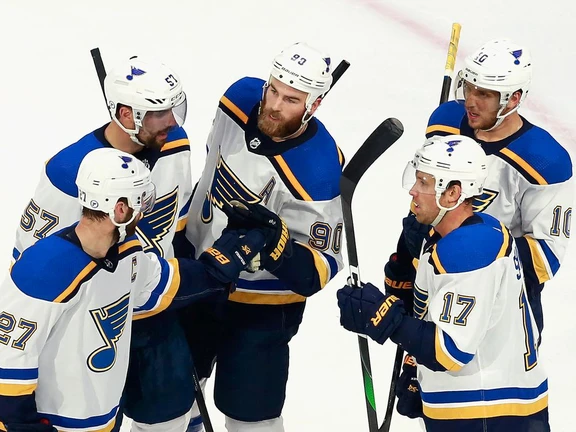 Ryan O'Reilly of the St. Louis Blues (centre) celebrates his first period power-play goal against the Vancouver Canucks in Game Four of the Western Conference First Round during the 2020 NHL Stanley Cup Playoffs at Rogers Place on August 17, 2020 in Edmonton.
