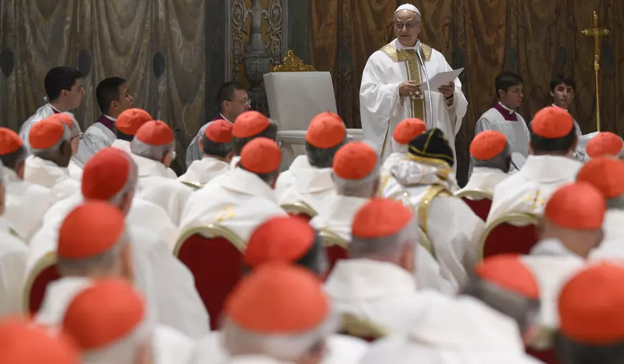 Newly elected Pope Leo XIV concelebrates Mass with the College of Cardinals inside the Sistine Chapel at the Vatican the day after his election as 267th pontiff of the Roman Catholic Church, Friday, May 9, 2025. (Vatican Media via AP)