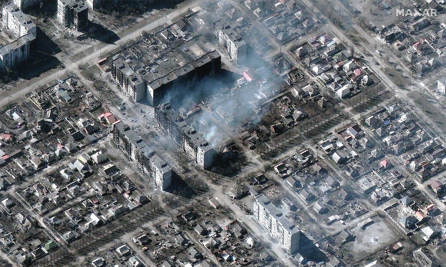 A photograph taken from the air of burning and destroyed apartment buildings in Mariupol, Ukraine.