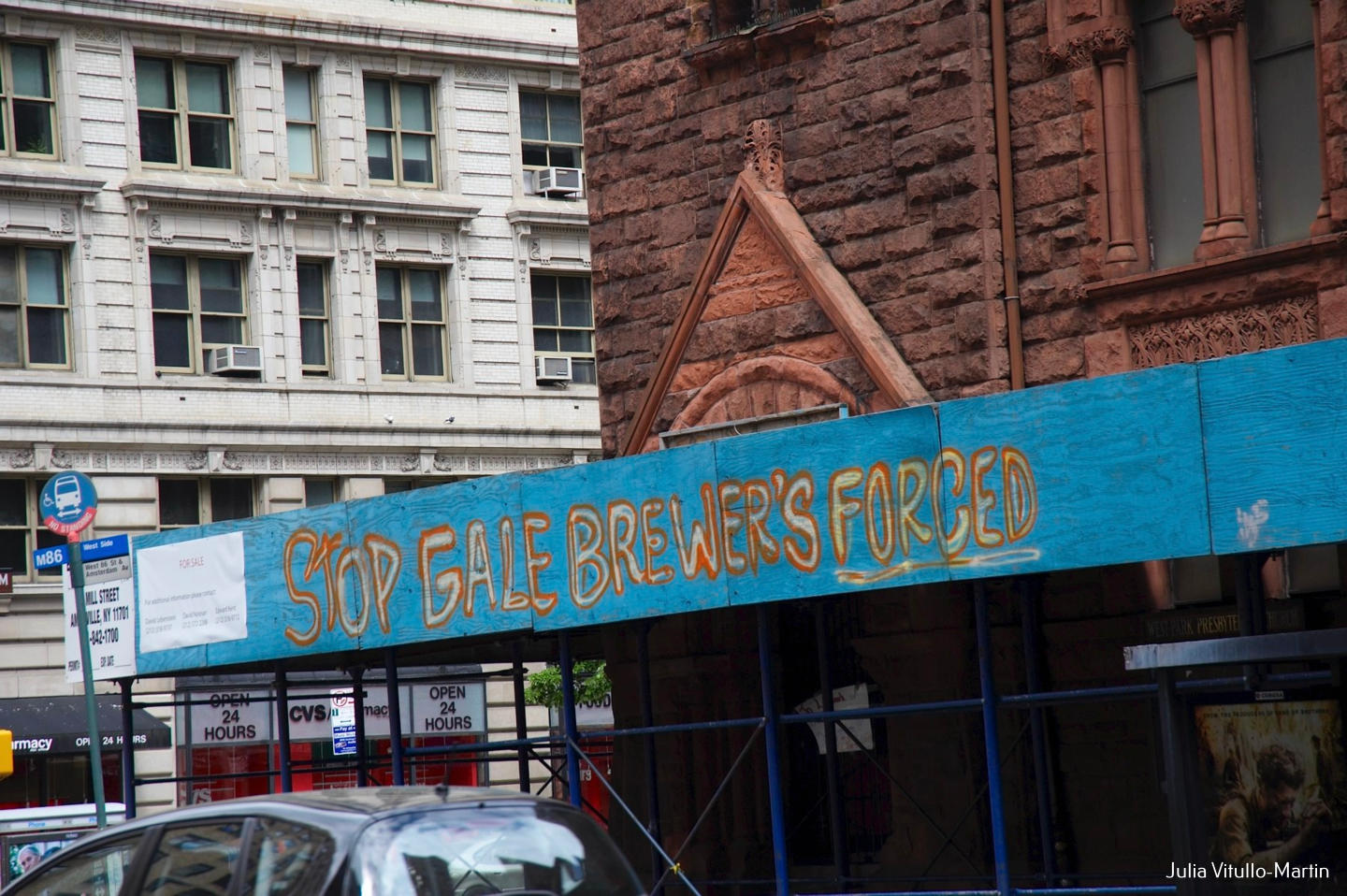 Scaffolding with text written, "Stop Gale Brewer's Forced."
