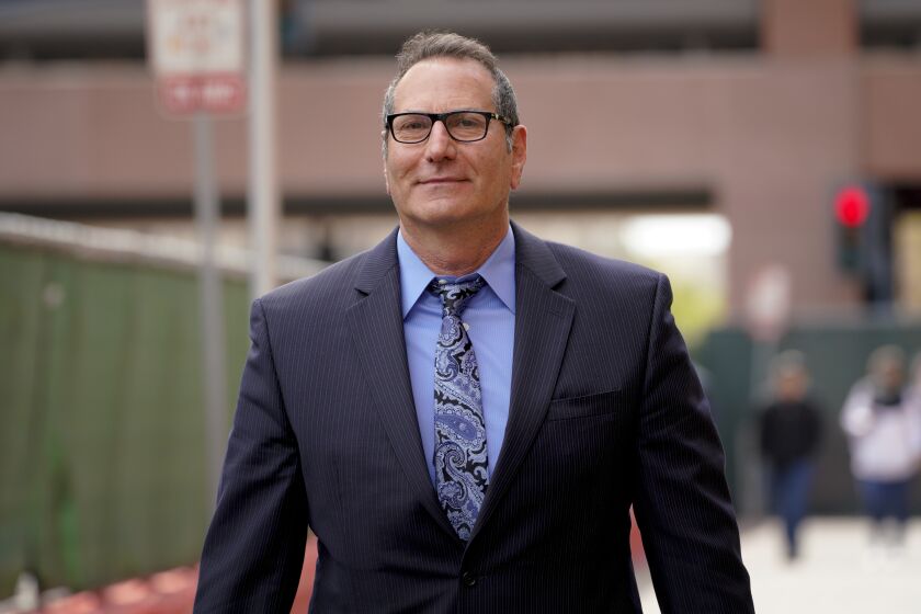 San Diego, CA - March 12: Former sheriff's Capt. Marco Garmo seen leaving Federal Court on Friday, March 12, 2021 in San Diego, CA., after his sentence hearing. (Nelvin C. Cepeda / The San Diego Union-Tribune)