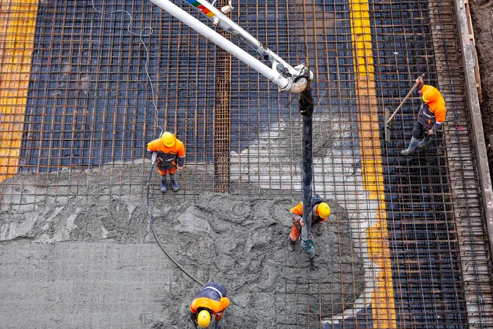 Concrete pouring on the construction site.