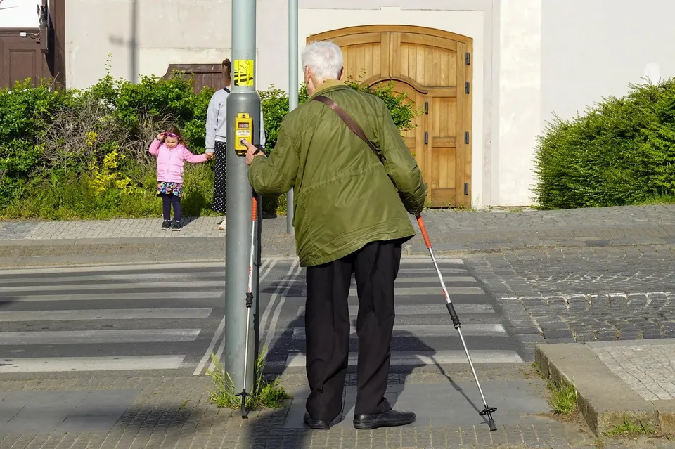 Senior Citizen Crossing A Street