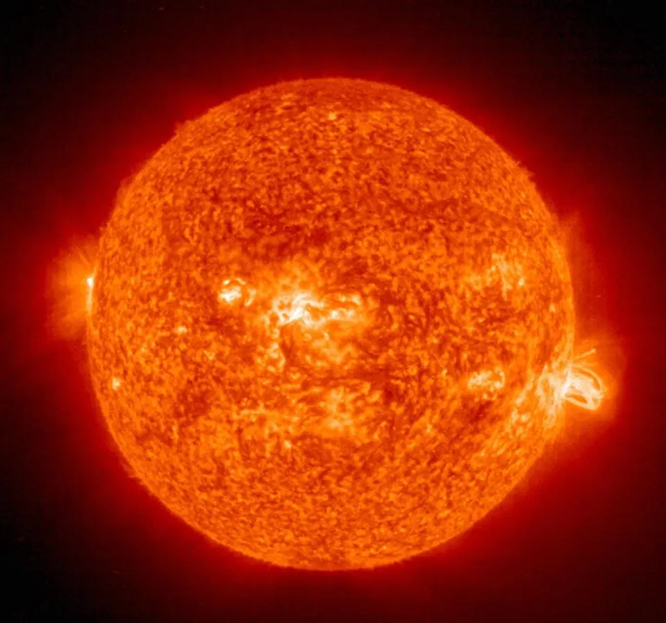 SPACE: This 19 August, 2004 NASA Solar and Heliospheric Administration (SOHO) image shows a solar flare (R) erupting from giant sunspot 649. The powerful explosion hurled a coronal mass ejection (CME) into space, but it was directed toward Earth.