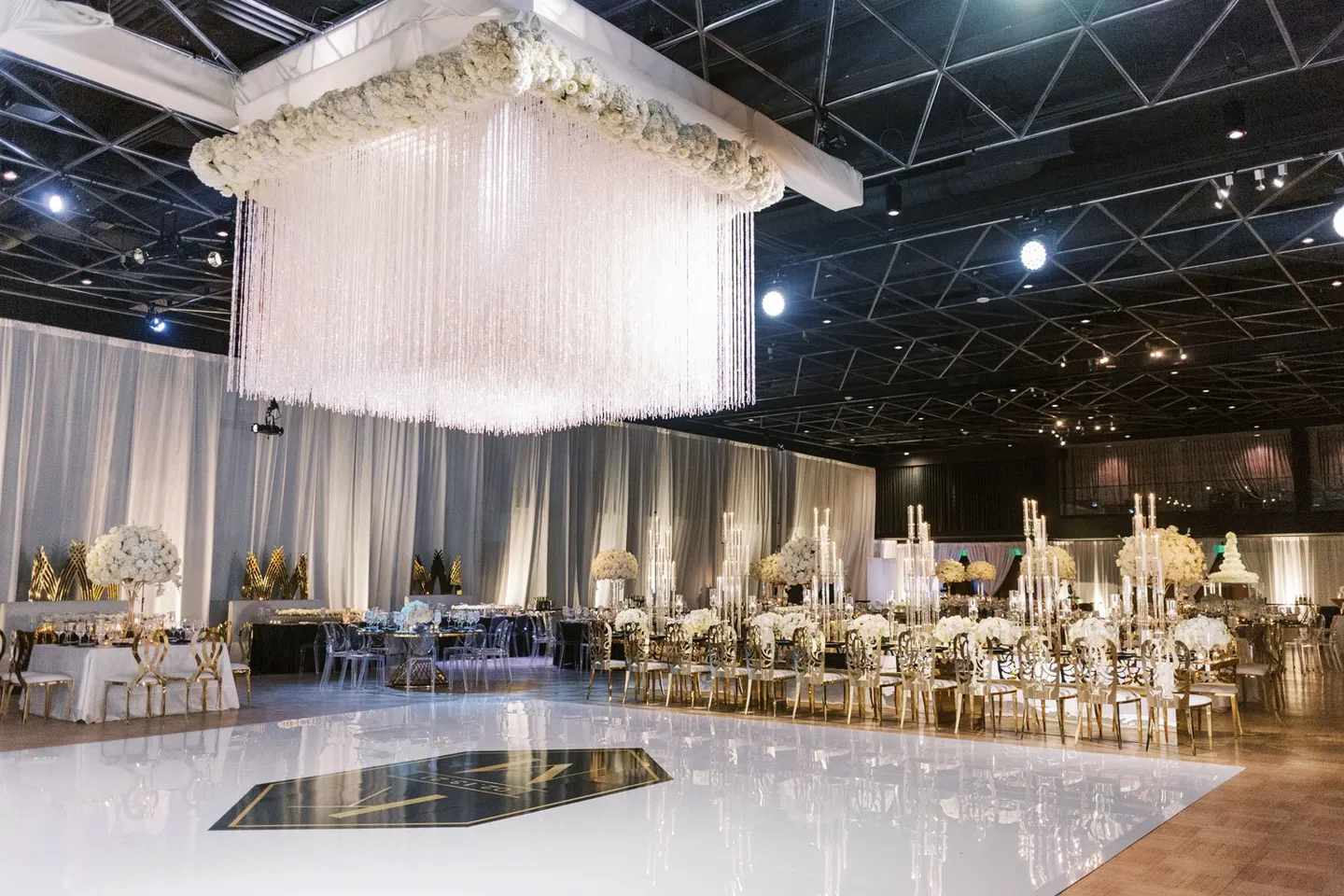 real wedding photo the statler dallas texas white gold and black wedding decor ceiling installation over dance floor