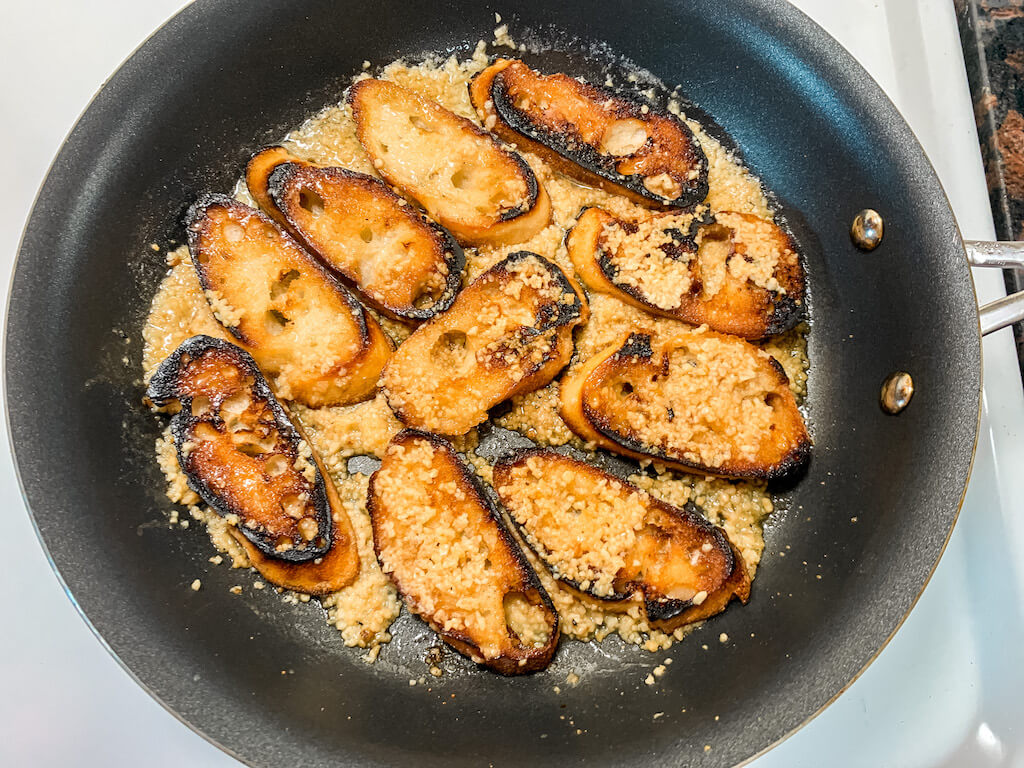 bruschetta recipe italian food crostini sourdough bread slices in garlic butter cooking skillet