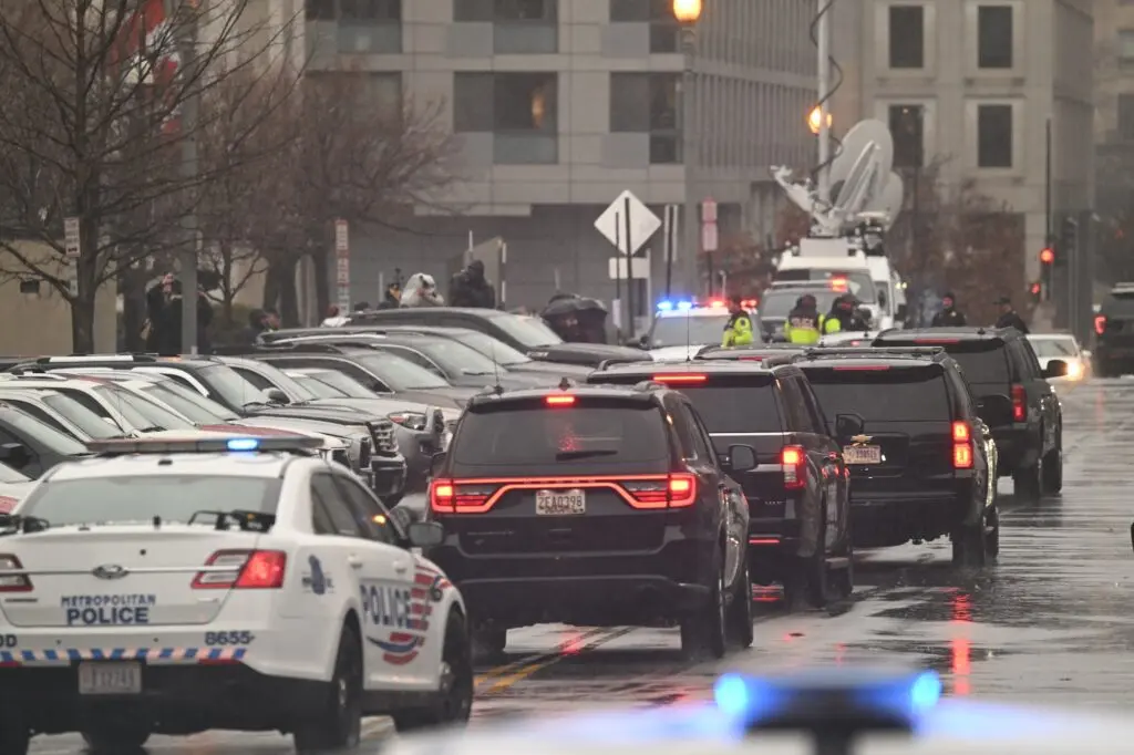 The motorcade with former US President Donald Trump departs the federal court for a hearing regarding the extent of his presidential immunity in Washington, DC, January 9, 2024.