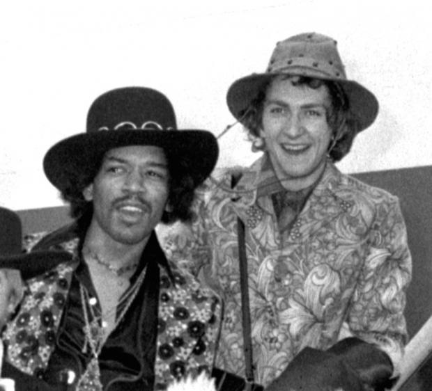 Islington Gazette: Jimi Hendrix and Mitch Mitchell about to board a plane at Heathrow Airport in 1968. Picture: PA Archive/PA Images