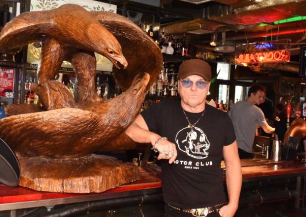 Hackney Gazette: Paul with the Eagle sculpture he bought at a knockdown price from an auction