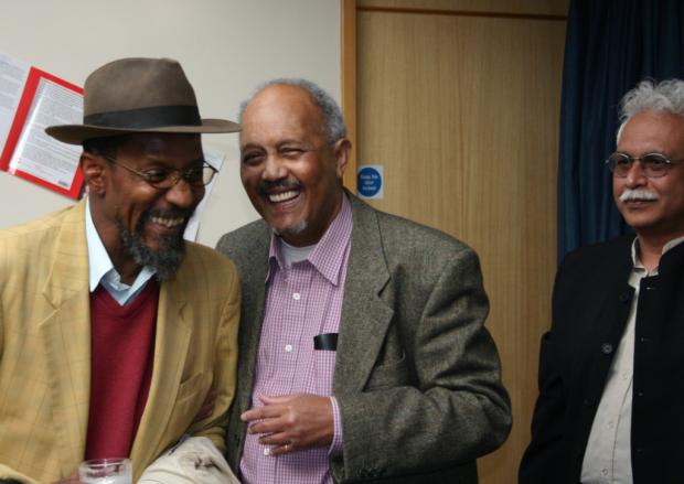 Islington Gazette: The late John La Rose (centre) with Linton Kwesi Johnson in 2005. Pic: Guy Farrar