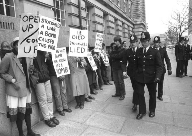 Islington Gazette: New Cross Massacre Action Committee demonstrators outside County Hall, London, in 1981. The inquest into the deaths of thirteen young people in a New Cross house fire was due to begin. Picture: PA