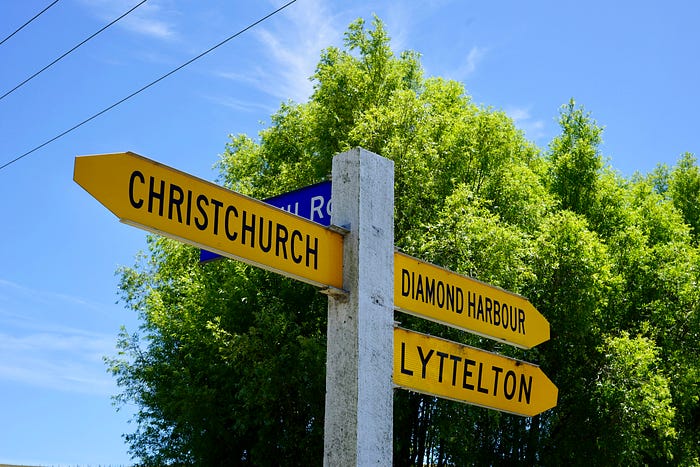An image of a street sign that points in the direction of Christchurch