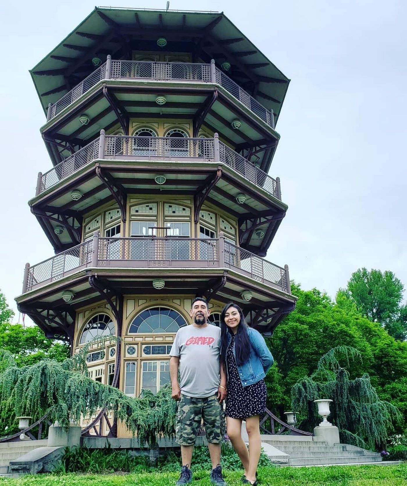 Isaías Cortina Muñoz, a bricklayer who lived in Baltimore for 20 years, died of COVID-19 in July. He is pictured with his daughter at Patterson Park. She was able to hold his hand when he died, one of 36 parishioners of Sacred Heart of Jesus Church who passed away, victims of the pandemic. Photo credit: Leovigilda Águila
